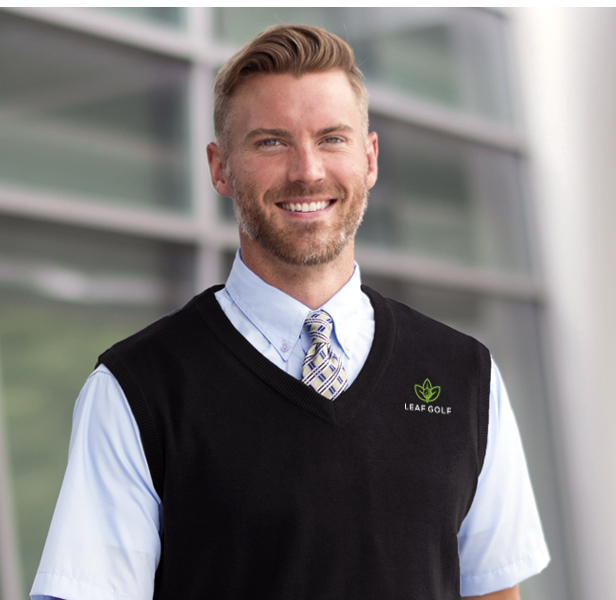 Man wearing dark sweater vest