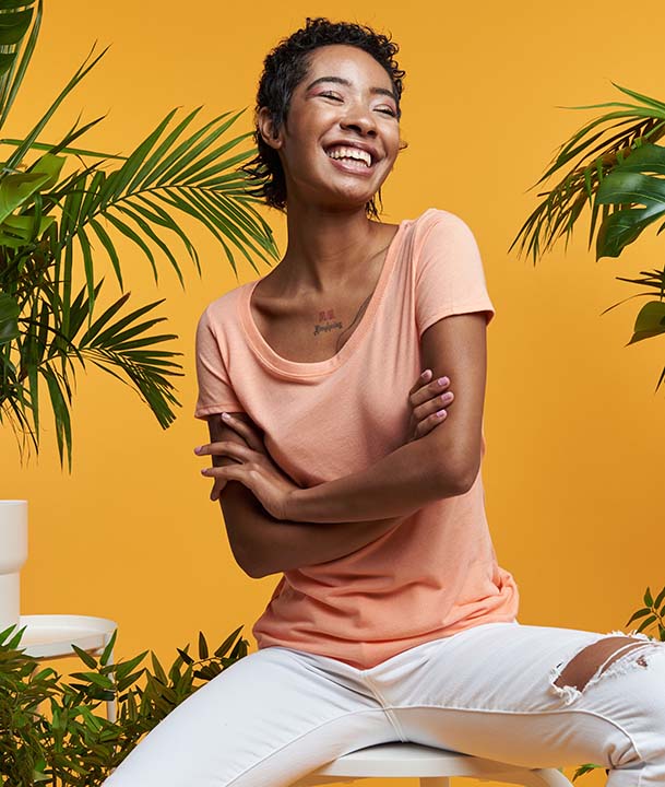 Young woman in orange shirt