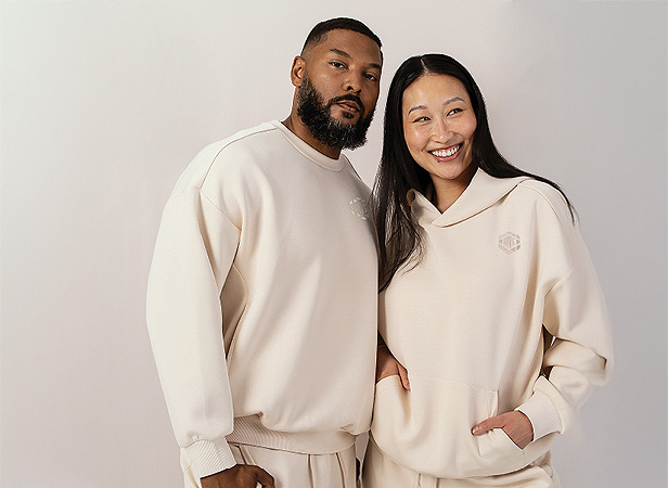 couple smiling wearing fleece sweats