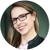 Amy Wolf, woman smiling wearing glasses