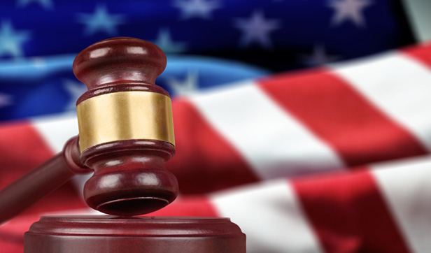 gavel against blurred US flag